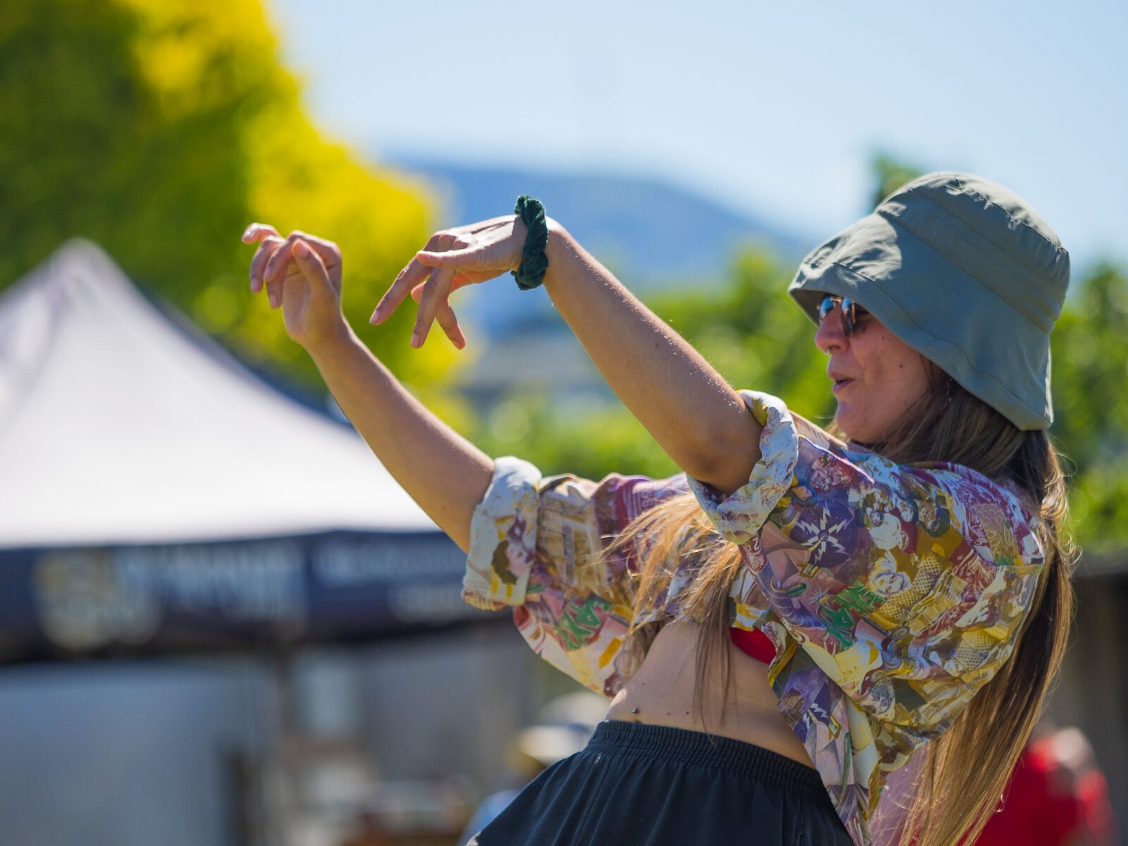 A festival-goer dancing in the crowd